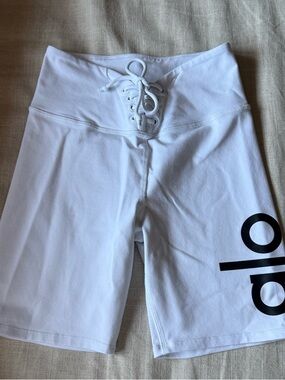 ALO Yoga White High-Waist Lace-Up Bike Shorts with Black Logo